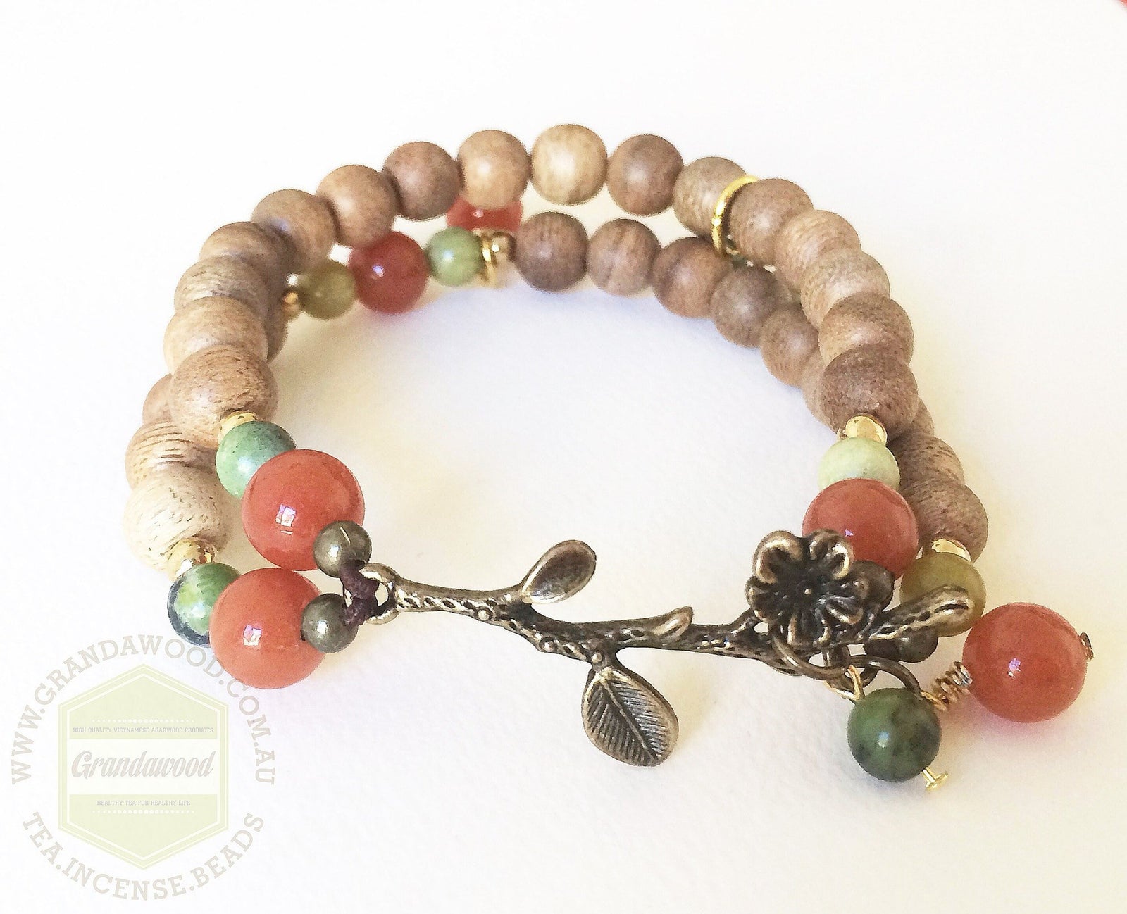 Agarwood lucky charm with red aventurine and grass turquoise bringing fortune and wealth -