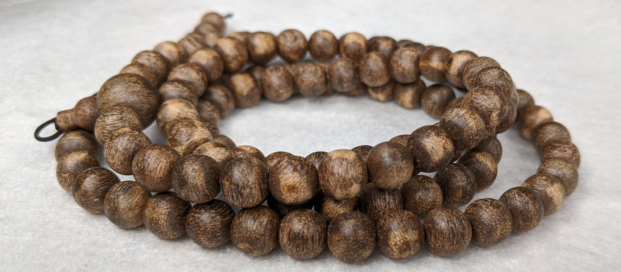 The Wiseman , Wisdom From The Elders, 108 mala made from Wild Agarwood from a small village -