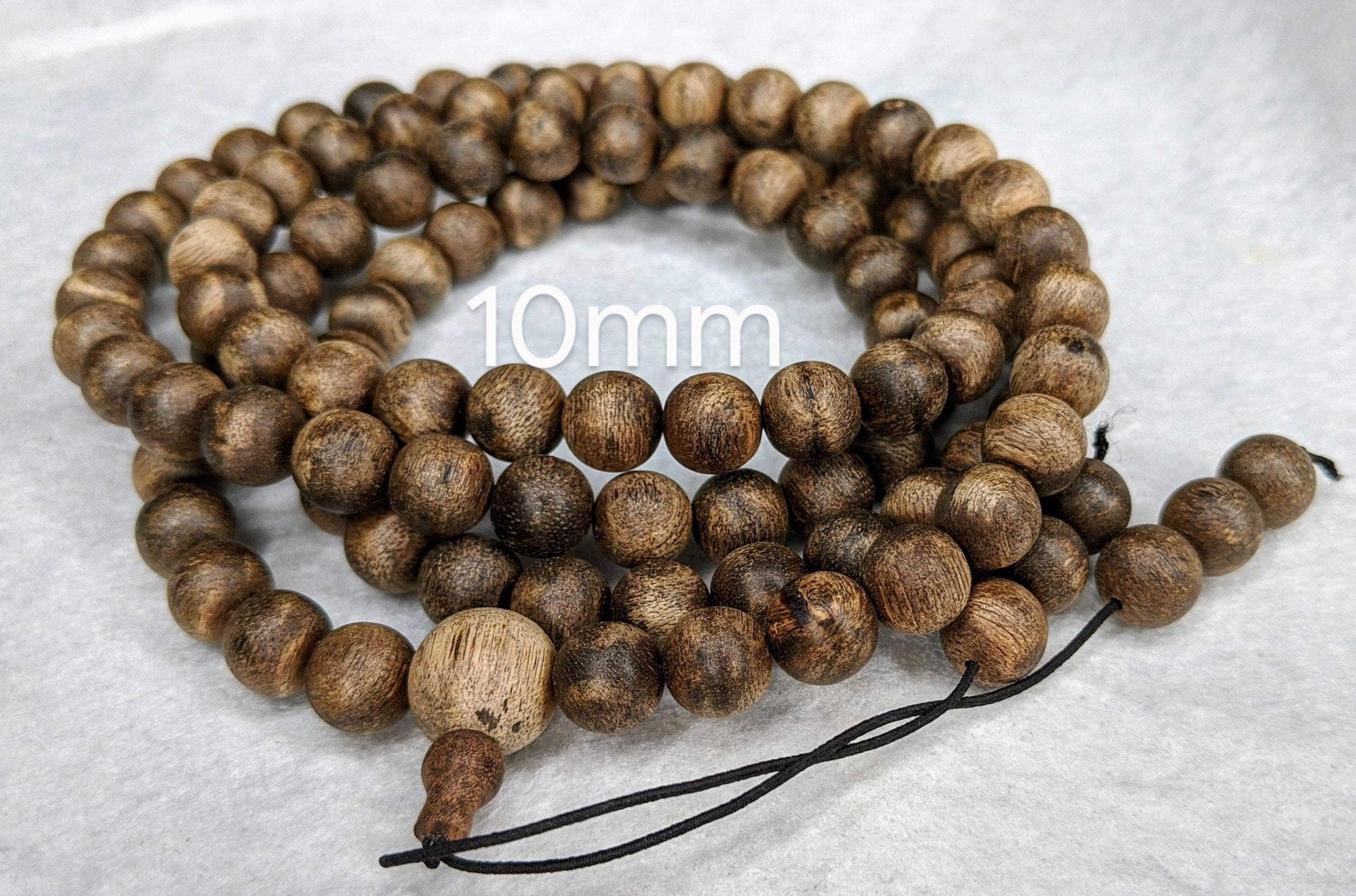 The Wiseman , Wisdom From The Elders, 108 mala made from Wild Agarwood from a small village - 10mm 45g