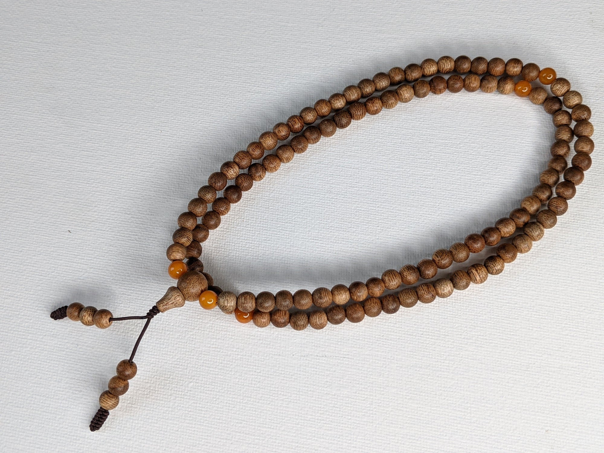 The Mood Improver - 108 Cultivated Agarwood mala with Baltic Ambers -